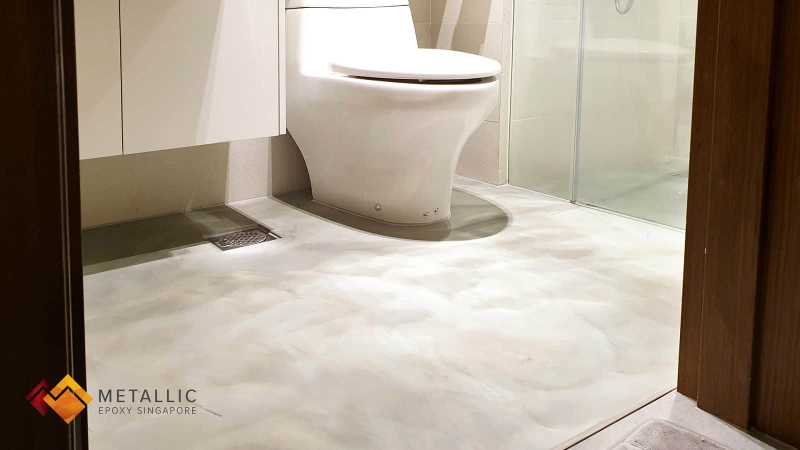 Metallic Epoxy Concrete Bathroom Floor