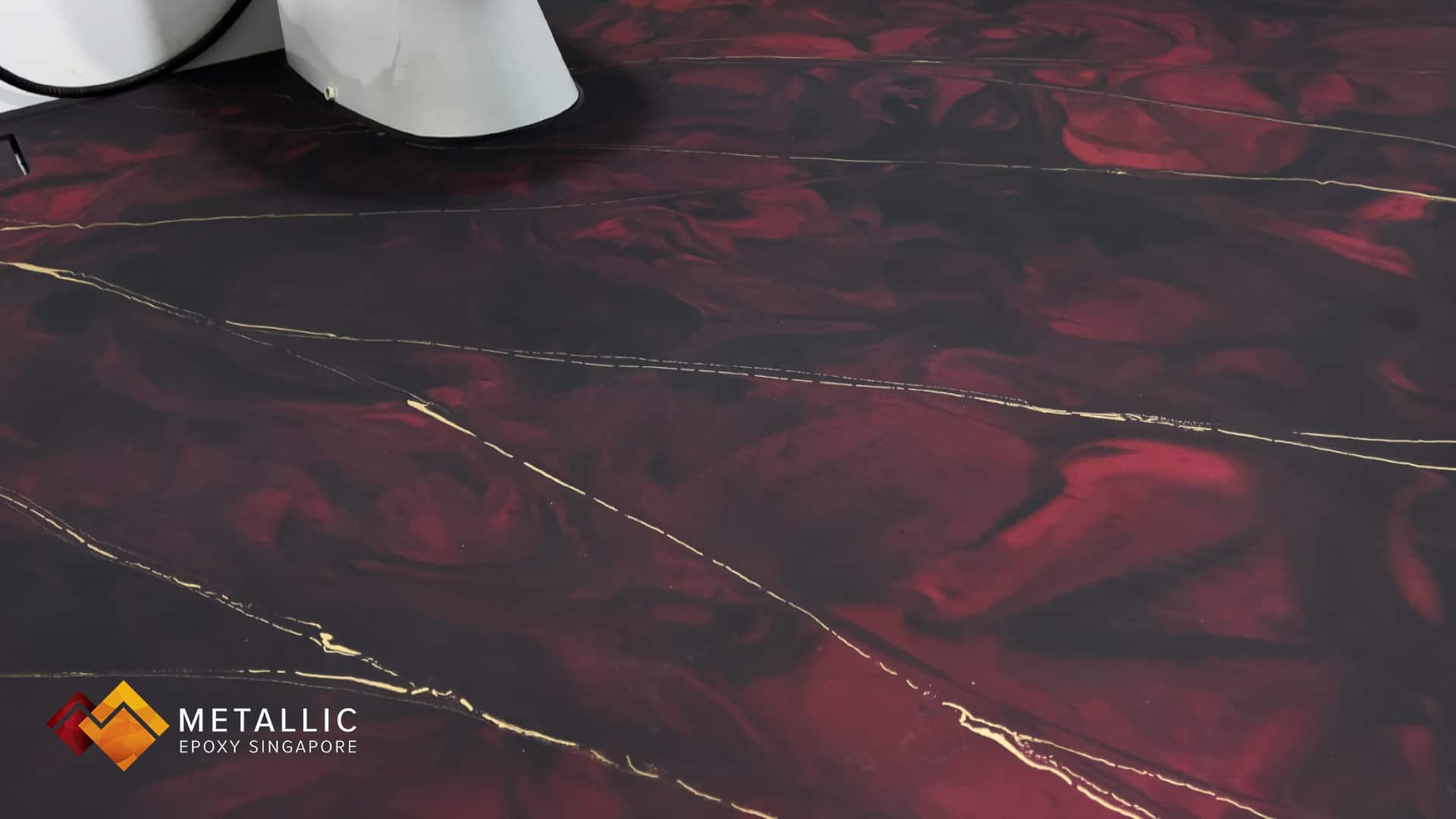 Metallic epoxy siwrl bathroom flooring
